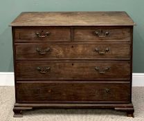 GEORGIAN MAHOGANY CHEST - of two short over three long oak lined drawers having brass circular