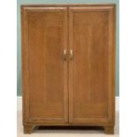 OFFERED WITH LOT 34 - MID CENTURY OAK TWO DOOR WARDROBE - half shelved interior,118cms H, 84cms W,
