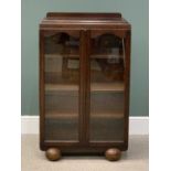 PLUS LOT 39 - POLISHED OAK TWO DOOR BOOKCASE CUPBOARD - on bun feet, 114cms H, 69cms W, 29cms D