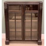 OFFERED WITH LOT 40 - BOOKCASE CUPBOARD - part ebonized example with twin glazed doors and four