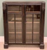 OFFERED WITH LOT 40 - BOOKCASE CUPBOARD - part ebonized example with twin glazed doors and four
