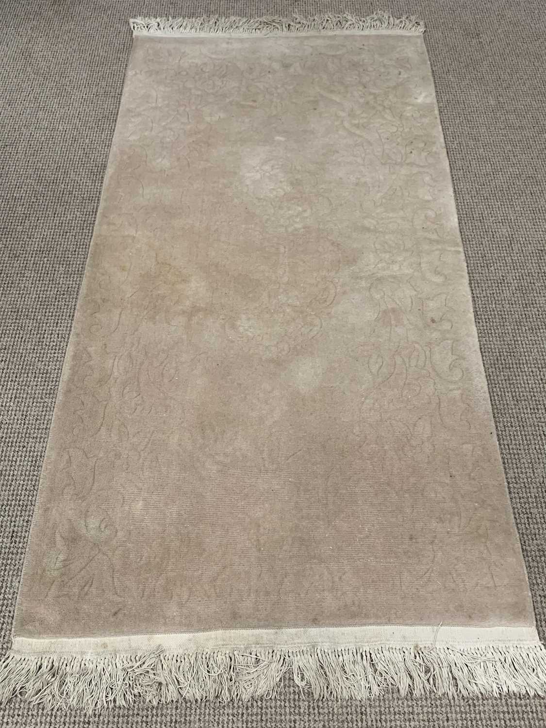 RUG - beige with floral pattern, label for "Imperial Jewel", 191cms L, 94cms W