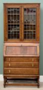 VINTAGE OAK BUREAU BOOKCASE - the upper section having twin leaded glazed doors with Arts & Crafts