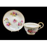 FINE NANTGARW PORCELAIN TEA CUP & SAUCER circa 1818-1820, with heart-shaped handle resting on rim,