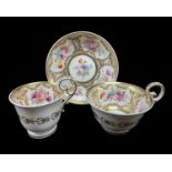 NANTGARW PORCELAIN TRIO circa 1818-1820, having elevated loop handles, painted with panels of flower