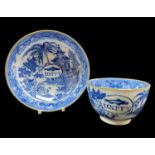 AN EARLY SWANSEA EARTHENWARE UNITY SUGAR BASIN & SAUCER, circa 1810-1820, printed in the transfer