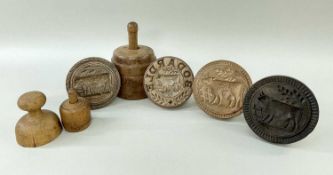 GROUP OF SEVEN VARIOUS SYCAMORE BUTTER STAMPS Welsh, late 19th / early 20th Century, each carved