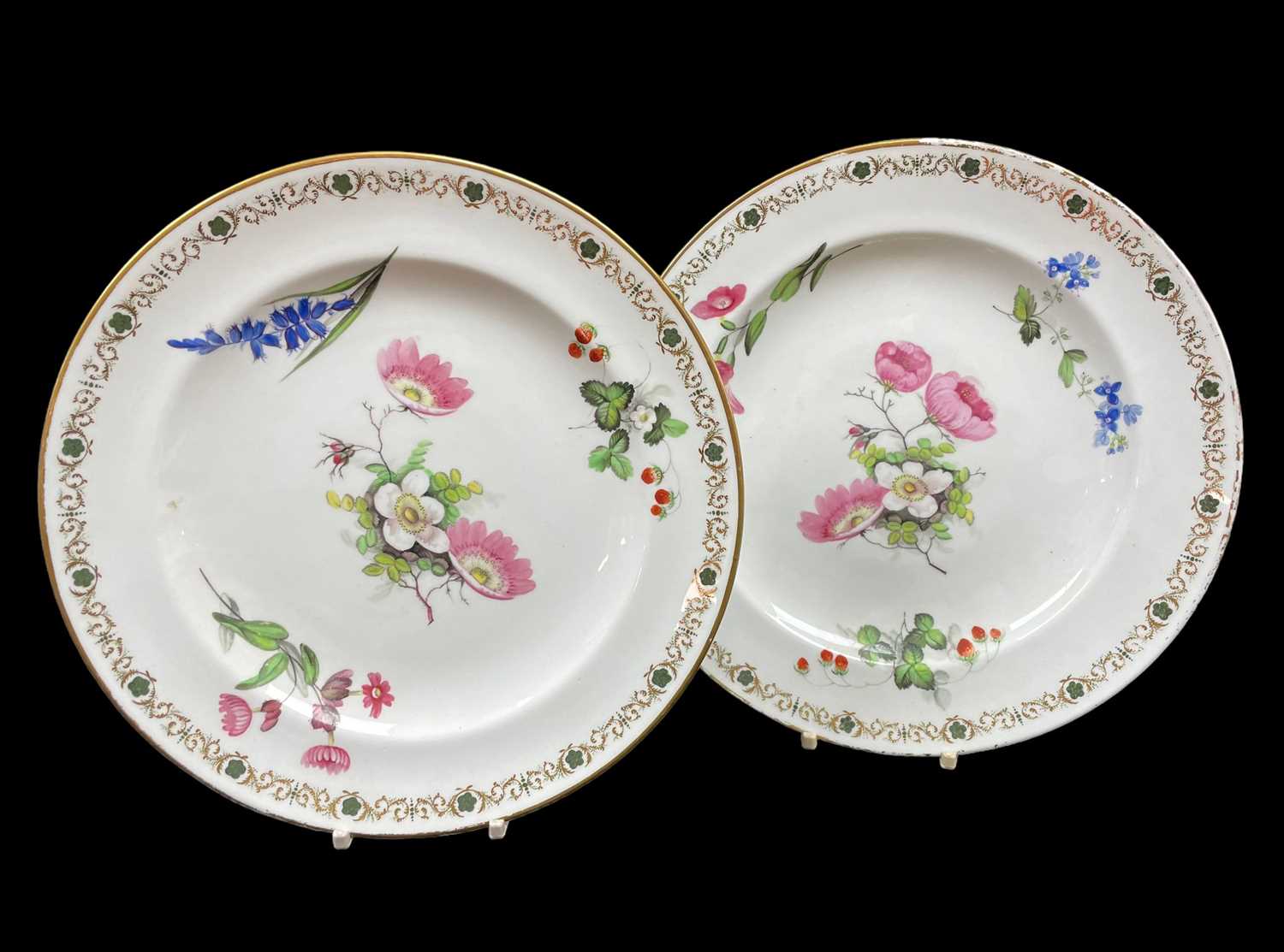 PAIR OF SWANSEA PORCELAIN PLATES circa 1815-1820, of circular form, decorated with flower studies