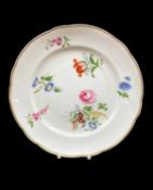 NANTGARW PORCELAIN PLATE circa 1818-1820, of lobed form, decorated with large off-centre posy and