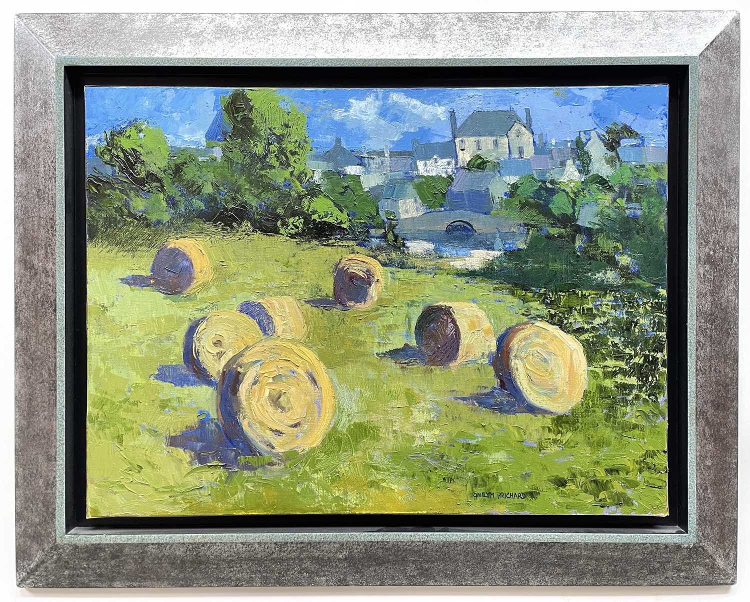 ‡ GWILYM PRICHARD oil on canvas - field with baled hay, river, bridge and town in background, - Image 2 of 2