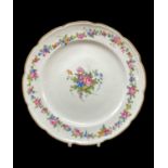 NANTGARW PORCELAIN PLATE circa 1818-1820, of lobed form with combed fluting to the border with a