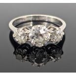 WHITE METAL THREE-STONE DIAMOND RING the three old cut stones measuring 1.3cts overall approx., ring