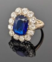 N.B.AMENDED: BLUE PASTE & DIAMOND CLUSTER RING, surrounded by thirteen diamonds, 0.10ct each