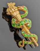 YELLOW METAL TORCH & SERPENT BAR BROOCH, the flaming torch having coiled serpent set with twenty-six