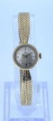 LADIES 14K GOLD OMEGA WRISTWATCH, the dial having baton hour markers, engraved 'Kristina 30.5.64',