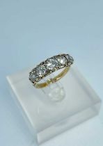 18CT GOLD FIVE-STONE DIAMOND RING, the five pavé set old European cut stones measuring 1.4cts