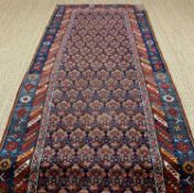 NORTHERN CAUCASIAN RUNNER, blue, red, cream, and green, with repeated geometric flower pattern,