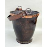 19TH CENTURY LEATHER FIRE BUCKET, copper studded, iron ring handle, 33cms high Provenance: private