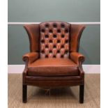 18TH CENTURY-STYLE LEATHER WING-BACK ARMCHAIR, with brown leather button upholstered back and