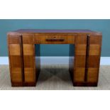 WARING & GILLOW ART DECO WALNUT WRITING DESK, later inset leather top, above arrangement of nine