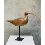 JUDITH NICOLL (Contemporary) carved wood - Curlew, raised on stand, the underside with hand