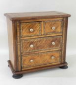 19TH CENTURY APPRENTICE CHEST OF DRAWERS, two short and two long drawers, inlaid borders, turned