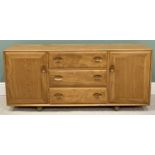 ERCOL WINDSOR LIGHT ELM SIDEBOARD - having three central drawers flanked by two cupboard doors,