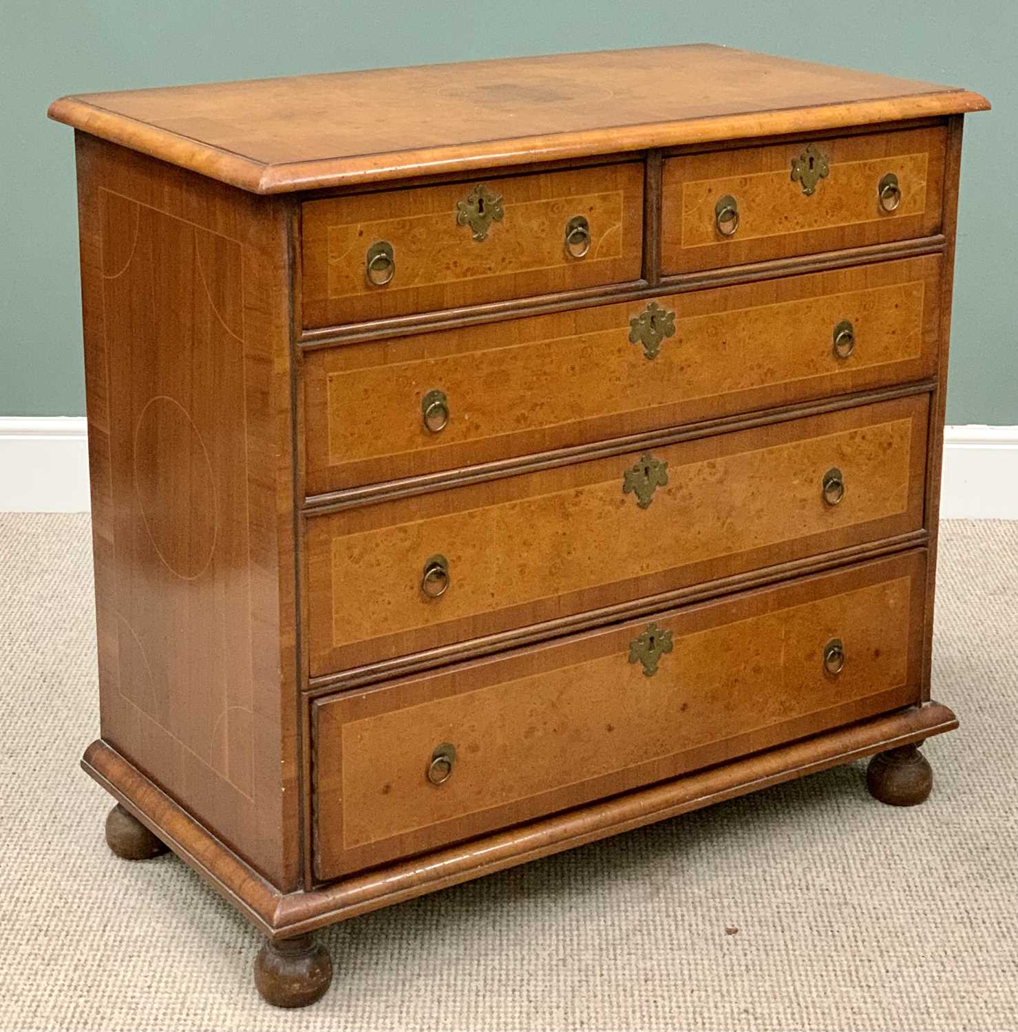 CROSSBANDED WALNUT CHEST OF DRAWERS - having two short over three long drawers with brass ring - Image 2 of 4