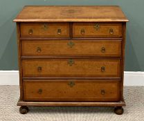 CROSSBANDED WALNUT CHEST OF DRAWERS - having two short over three long drawers with brass ring