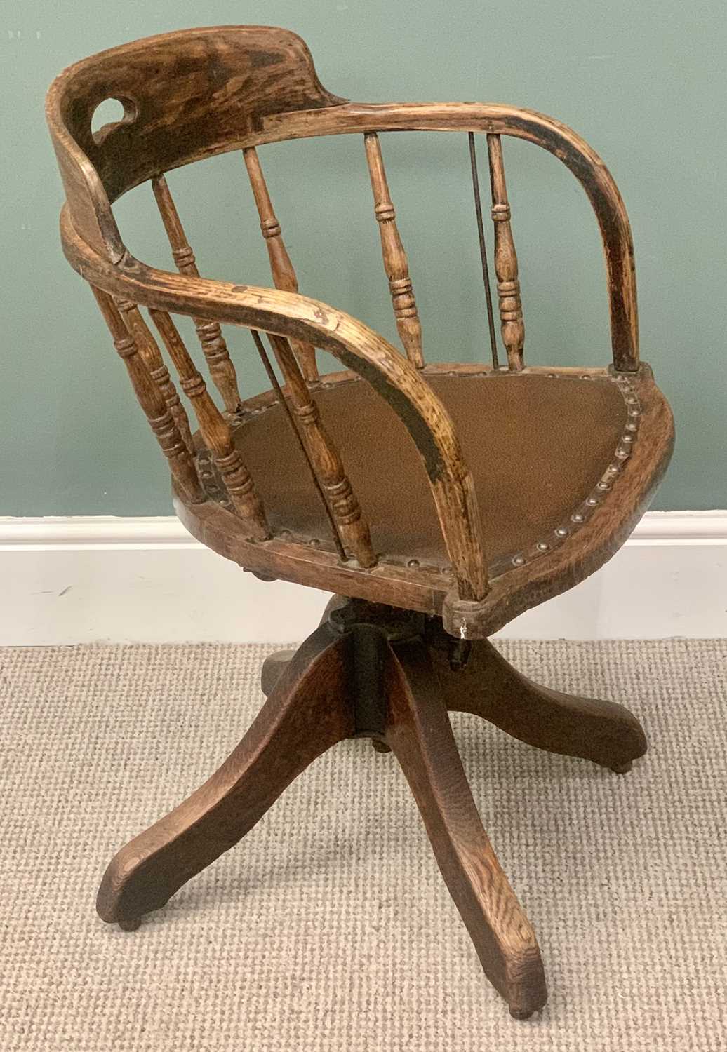 VICTORIAN OAK CURVED BACK OFFICE CHAIR - spindle uprights, rexine seat, on a swivel base and four - Image 3 of 5