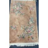 HEAVY GAUGE FINE QUALITY WASHED WOOLLEN CHINESE RUG - peach ground with typical floral motifs and