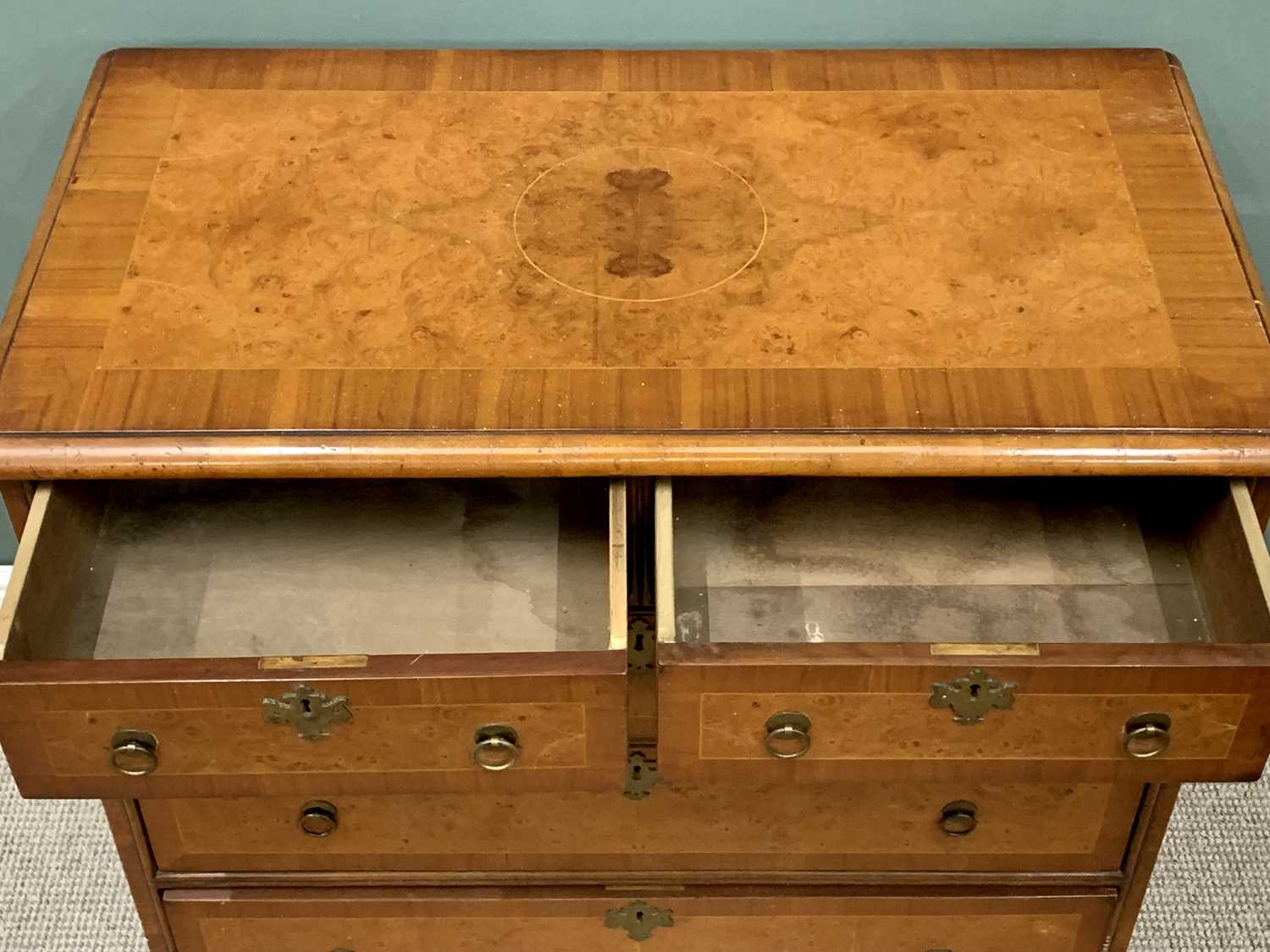 CROSSBANDED WALNUT CHEST OF DRAWERS - having two short over three long drawers with brass ring - Image 3 of 4