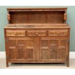 EARLY 20th CENTURY POLISHED OAK BUFFET SIDEBOARD - having three drawers over two base cupboard