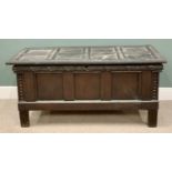 ANTIQUE CARVED OAK COFFER - having fielded panels in the Gothic style, with lift-up lid and interior