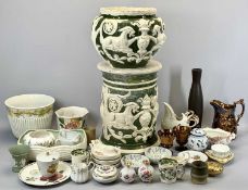 VICTORIAN POTTERY JARDINIERE ON STAND - cream and green glazed and moulded in relief with animals,