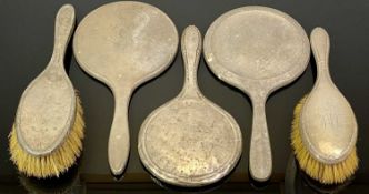 NON-MATCHING HALLMARKED SILVER DRESSING TABLE HAND MIRRORS & BRUSHES GROUP - to include three