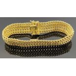 ITALIAN 18CT GOLD HERRINGBONE PATTERN BRACELET - by Sadusa, stamped '750' with 73 AR mark, 19cms