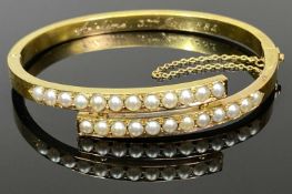 VICTORIAN, BELIEVED 15CT GOLD & SEED PEARL BANGLE - inscribed to the interior 'Adeline 3rd Jan