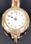 LADY'S VINTAGE 9CT GOLD EXPANDING BRACELET WRISTWATCH - the white dial set with Arabic numerals, not