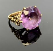 9CT GOLD AMETHYST RING - Birmingham date letter for 1971, 15mm diameter round cut amethyst, claw set