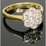 18CT GOLD SEVEN STONE DIAMOND FLORAL CLUSTER RING - estimated total diamond weight 0.70ct, the