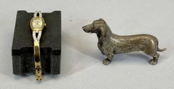 SILVER PLATED CAST BRONZE FIGURE OF A DASCHUND 6cms H, 10cms L, together with an Accurist designer