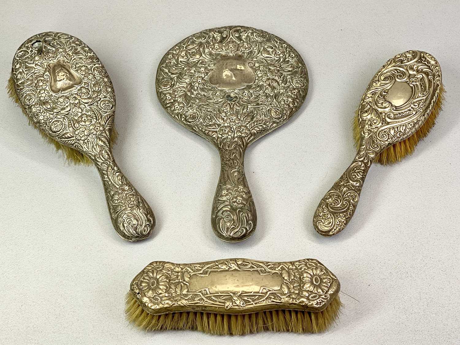 MIXED HALLMARKED DRESSING TABLE HAND MIRROR & BRUSHES GROUP - to include a matching circular hand