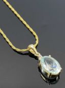 ITALIAN 14CT GOLD PENDANT NECKLACE - with 15 x 10mm oval, possibly aquamarine, below a grouped