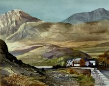 ALAN KIRKPATRICK (British born 1929), watercolour - lakeside houses with extensive mountains beyond,