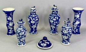 CHINESE PRUNUS DECORATED JARS & COVERS, 2 PAIRS – a pair of vases and an individual cover, 27.5cms H