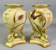 GRAINGER ROYAL CHINA WORKS WORCESTER BLUSH IVORY VASES, A PAIR - tri-footed and on plinths, each