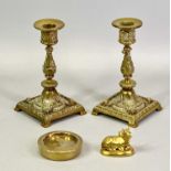 GILDED CAST BRASS CANDLESTICKS, A PAIR - late 19th century with baluster stems and square bases,
