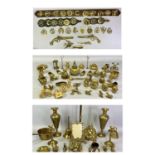 BRASSWARE - a large collection including horse brasses, candlesticks, vases, table lamp, door