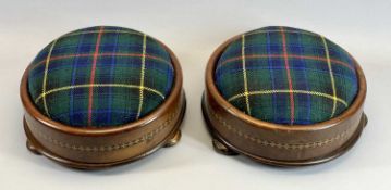MID VICTORIAN CIRCULAR WALNUT FOOTSTOOLS, A PAIR – with inlaid decorative band on bun feet with